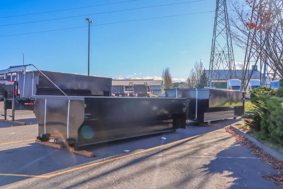 Roll-off dumpster ready for waste disposal at job site for 4 Yard Dumpster Rental in Black Mountain
